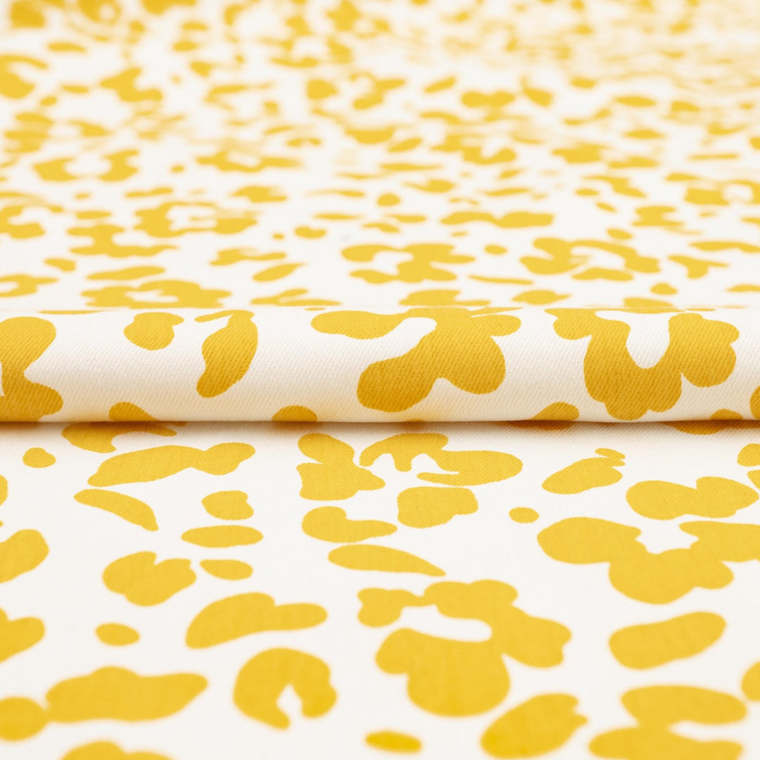 Twill Sunny Splotches cotton spandex fabric with yellow splotches for jackets and skirts