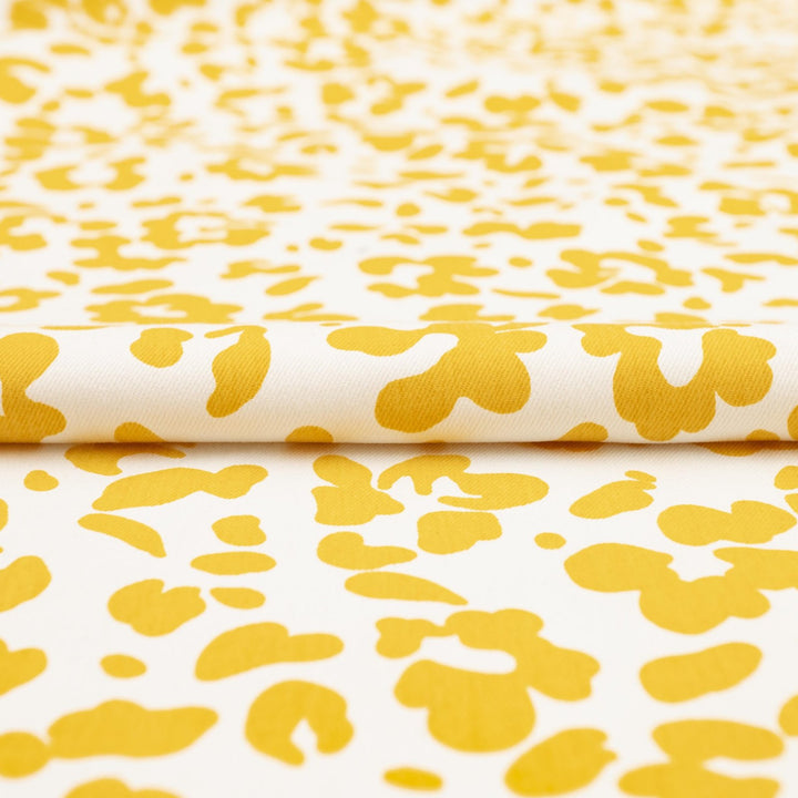 Twill Sunny Splotches cotton spandex fabric with yellow splotches for jackets and skirts