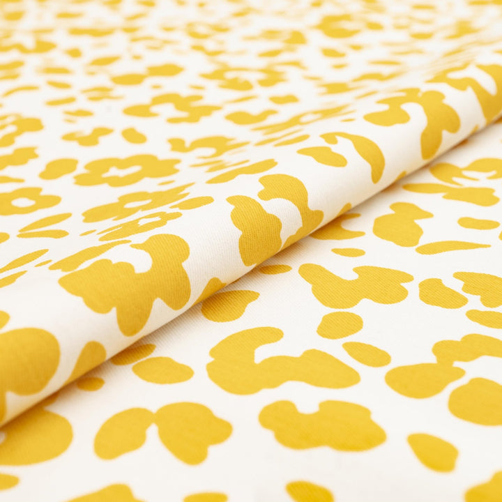 Twill Sunny Splotches cotton spandex fabric with yellow splotches for jackets and skirts