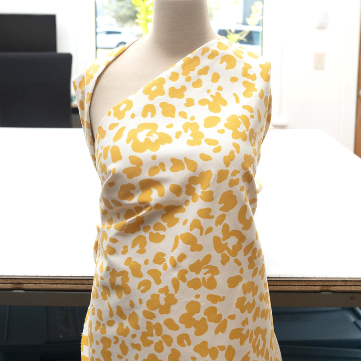 Twill Sunny Splotches cotton spandex fabric with yellow splotches for jackets and skirts