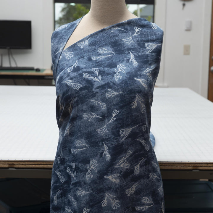 Rayon Crepe fabric soft blue with white painted flowers, 57 inch wide, perfect for dresses and tops