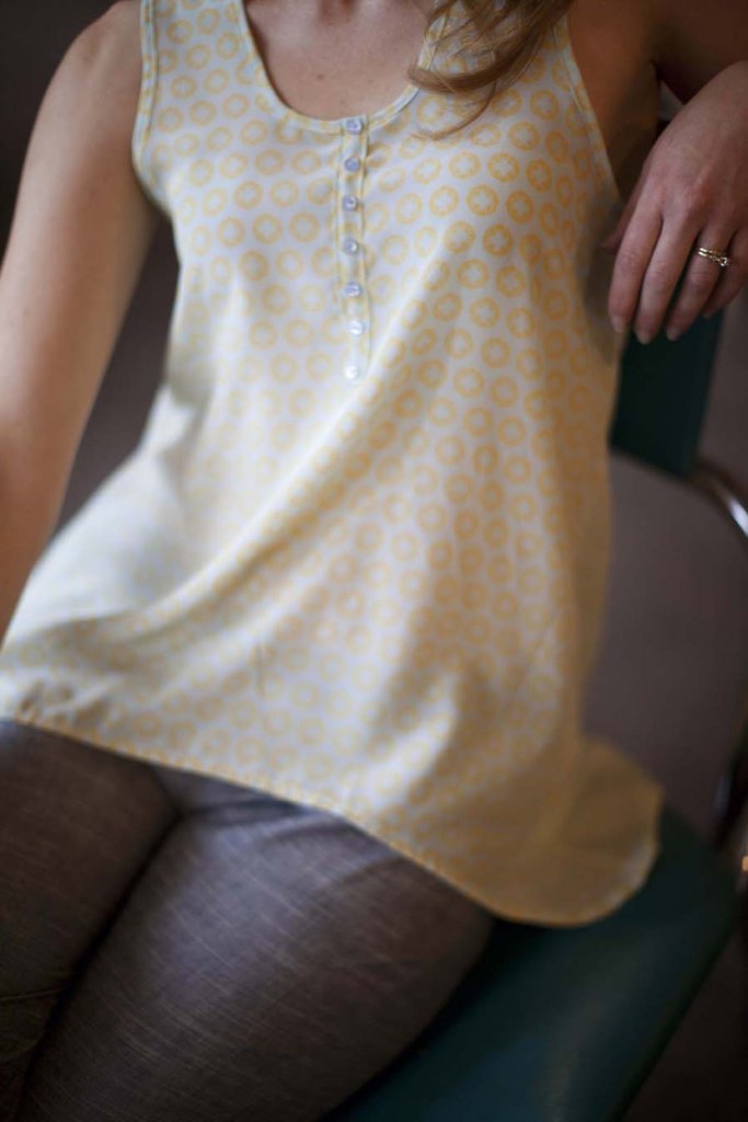 Sew Liberated Myla Tank sewing pattern with flared shaping, split skirt detail, low back hem, and customizable faux placket design