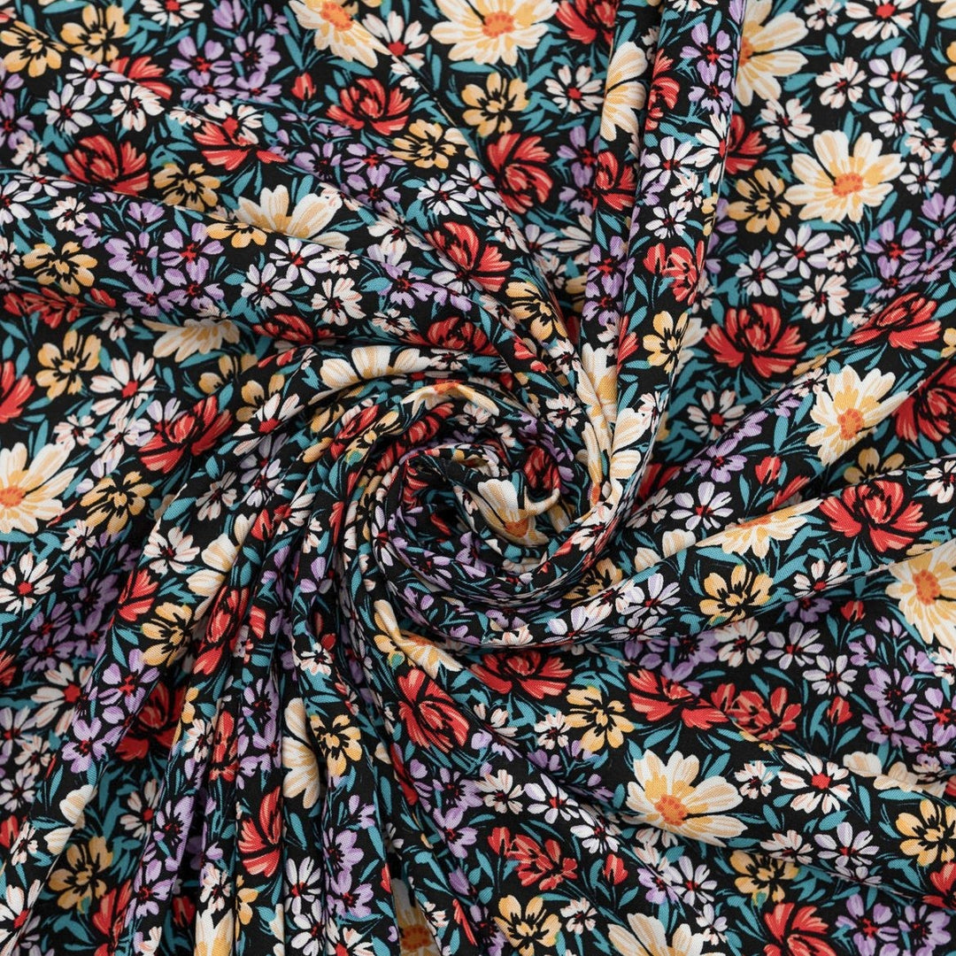 Rayon Crepe Noir Garden Medley fabric – 100% rayon, 56 inches wide, black floral deadstock fabric for dresses, blouses, and skirts