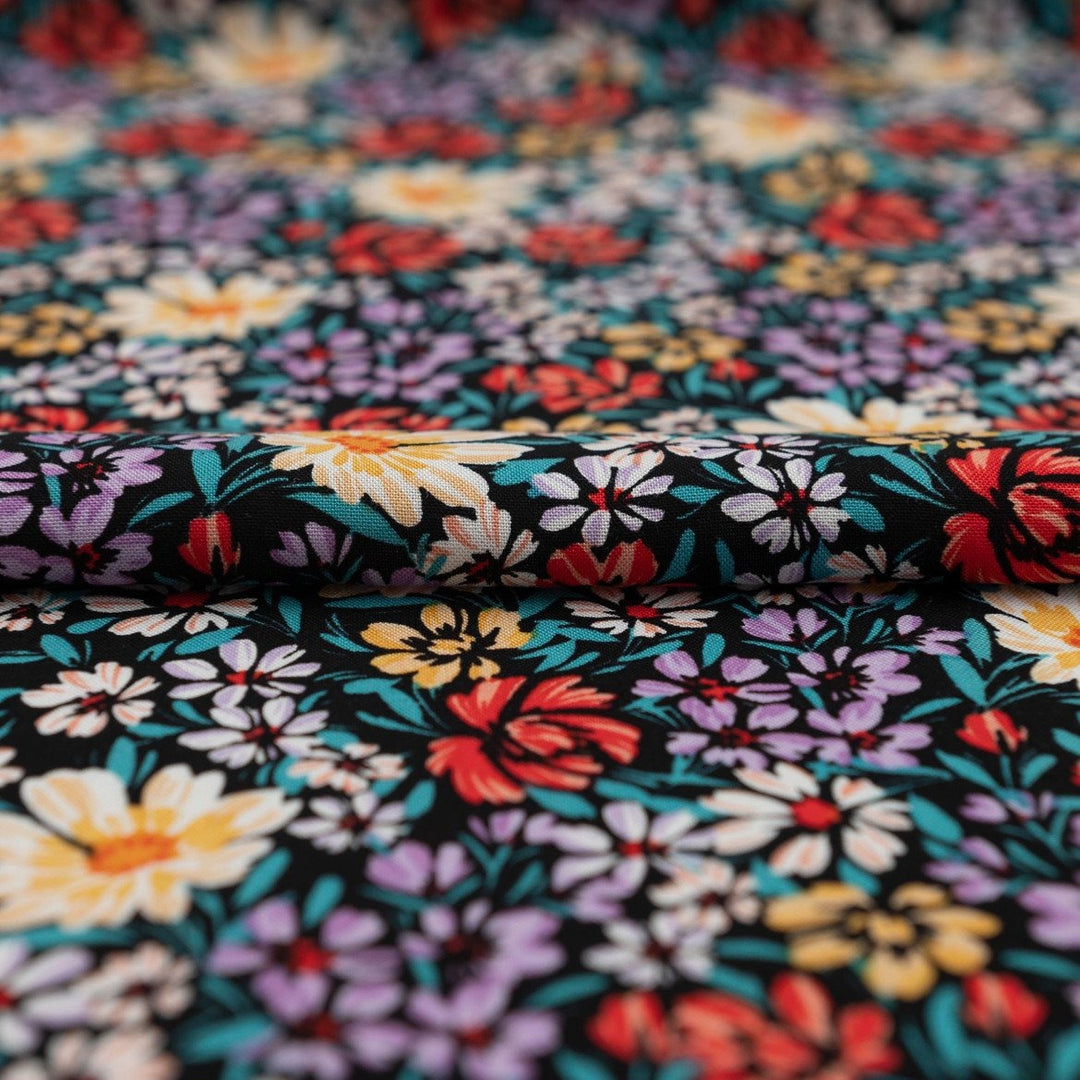 Rayon Crepe Noir Garden Medley fabric – 100% rayon, 56 inches wide, black floral deadstock fabric for dresses, blouses, and skirts