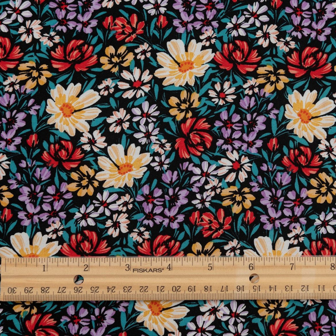 Rayon Crepe Noir Garden Medley fabric – 100% rayon, 56 inches wide, black floral deadstock fabric for dresses, blouses, and skirts