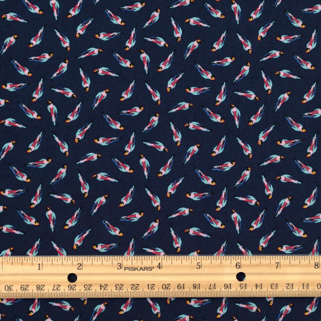 Viscose Challis fabric in navy blue with whimsical parrot print for lightweight summer dresses, skirts, and loungewear