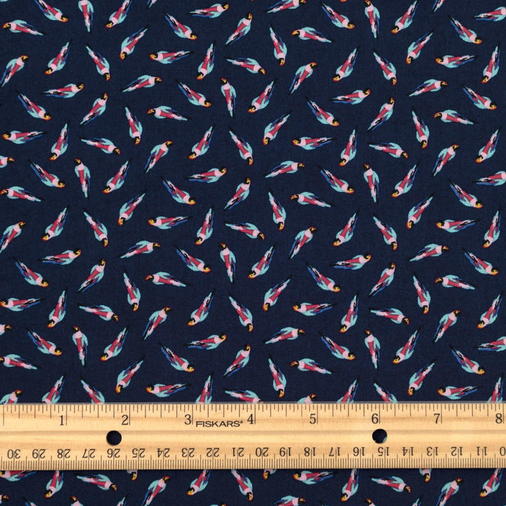 Viscose Challis fabric in navy blue with whimsical parrot print for lightweight summer dresses, skirts, and loungewear
