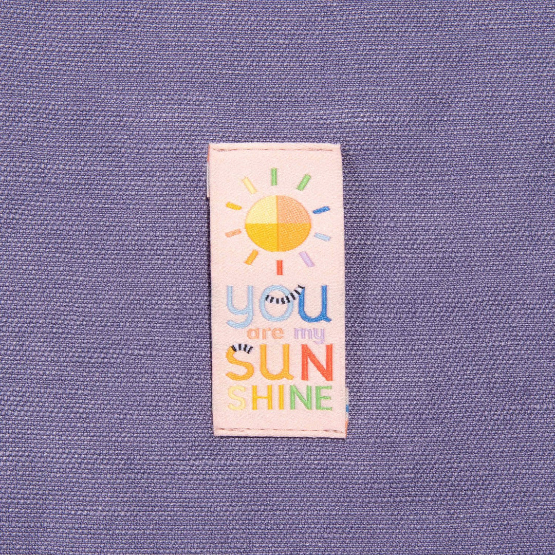Kylie and the Machine Going Places kids’ labels by Brook Gossen – colorful woven tags and stickers with positive affirmations