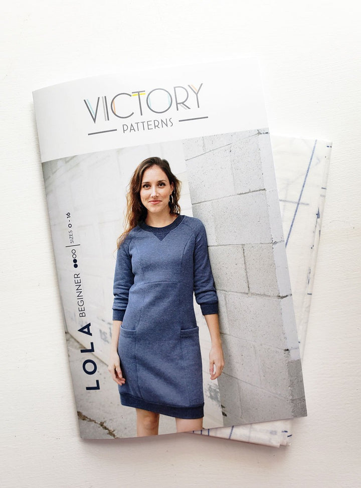 Victory Patterns Lola slip-on sweater dress with raglan sleeves, princess seams, oversized pockets, and ribbed neckline, hem, and cuffs
