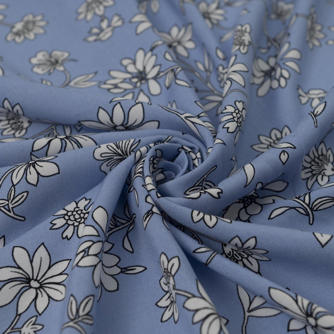 Rayon Challis Blooms on Porcelain Blue fabric, soft pastel floral print, 54 inches wide, lightweight sewing material for dresses and blouses