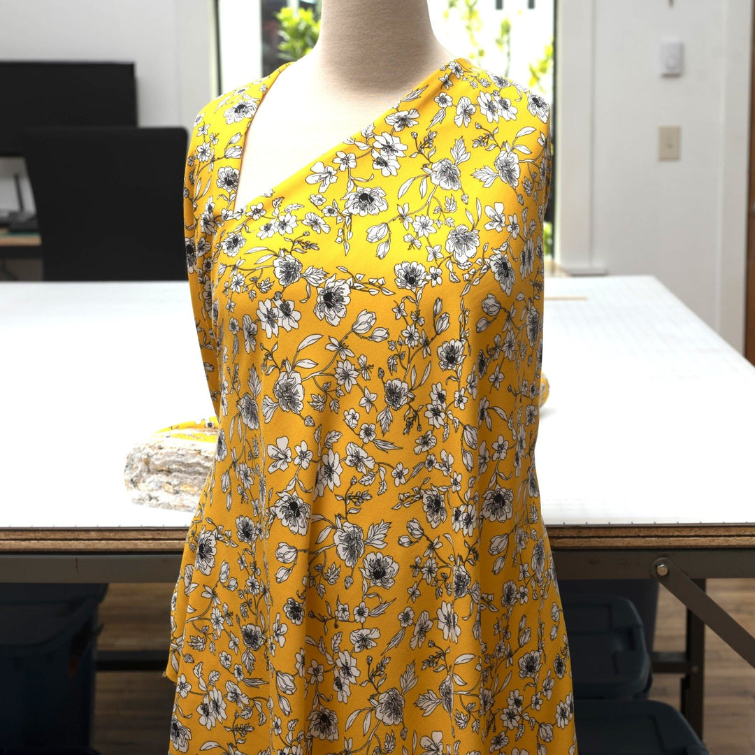 Viscose Crepe Fabric Blooms on Sunflower Yellow with White Floral Print