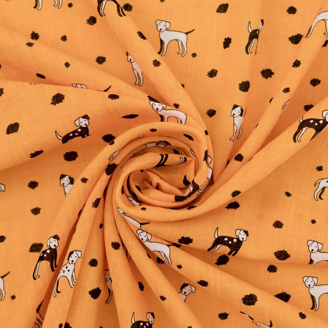 Rayon Cotton Voile fabric with playful black and white puppy print on sunshine yellow background, 50% rayon 50% cotton, 140cm width