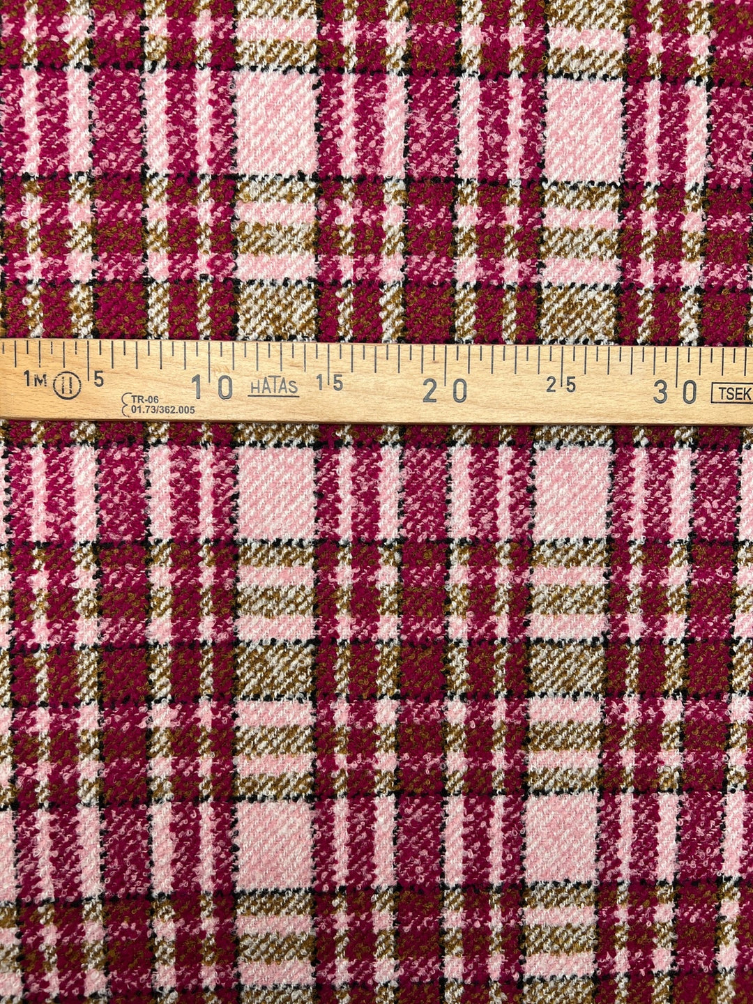 Italian bouclé suiting fabric in beige and pink plaid, medium-heavy acrylic polyamide blend, ideal for structured coats, skirts, and tailored suits.