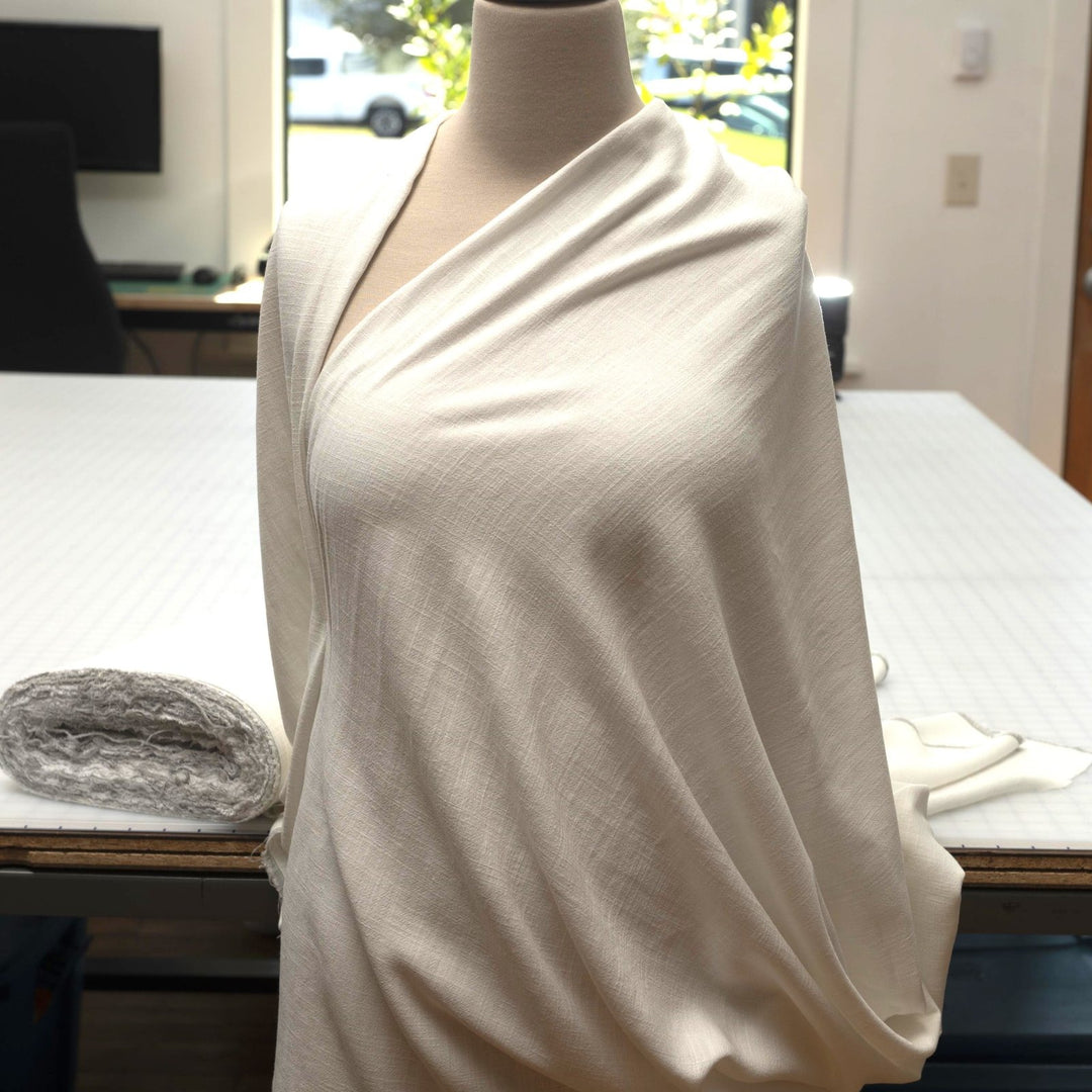 Linen and Rayon Blend fabric in pearl white with subtle texture, perfect for dresses, skirts, and blouses