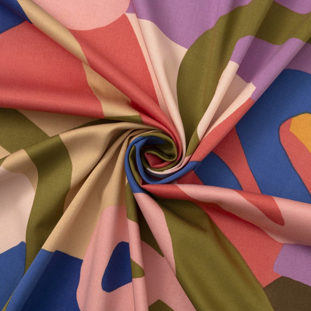 Rosella Natural Flow viscose woven stretch fabric by Nerida Hansen in moss green, coral, cobalt, lilac and beige tones with satin finish