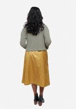 Grainline Studio Reed Skirt sewing pattern sizes 0–18 with inset and patch pockets, button front or invisible zipper closure, medium-weight fabrics