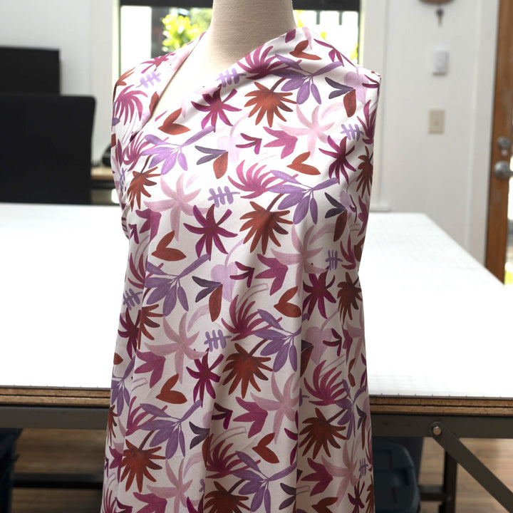Cotton Voile Palm Heaven by Nerida Hansen 100% cotton lightweight fabric with purple palm print