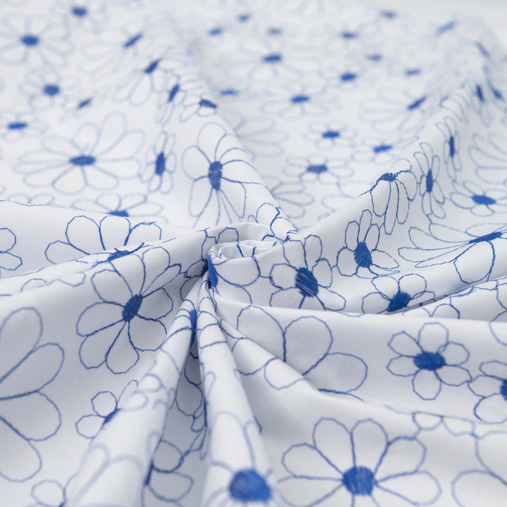 Cotton Lawn Embroidered Sapphire Blooms – 100% cotton, 56 inches wide, crisp embroidered fabric for sewing shirts, skirts, sundresses, and elegant garments