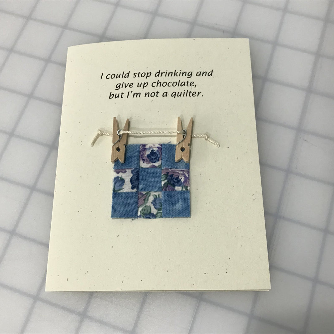 Humorous note card with quote: ‘I could stop drinking and give up chocolate, but I am not a quitter…oh, wait,’ includes matching envelope.