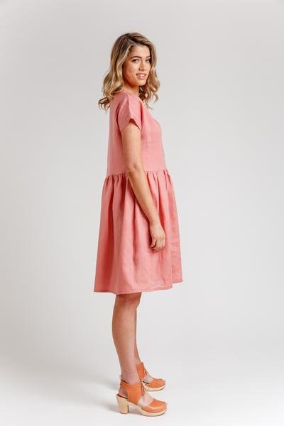 Megan Nielsen Olive sewing pattern for relaxed-fit blouse and dress with V-neck insert, optional patch pocket, and gathered skirt