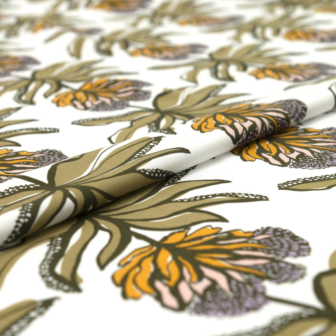 Ecovero Viscose Manifesto Ecru fabric by Nerida Hansen with botanical print in soft ecru and green, 58-inch wide, lightweight and drapey.
