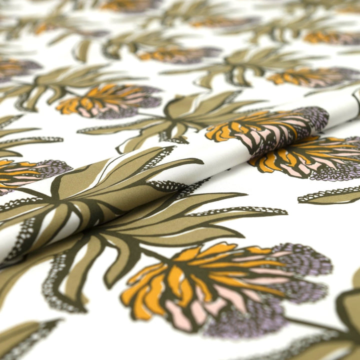 Ecovero Viscose Manifesto Ecru fabric by Nerida Hansen with botanical print in soft ecru and green, 58-inch wide, lightweight and drapey.