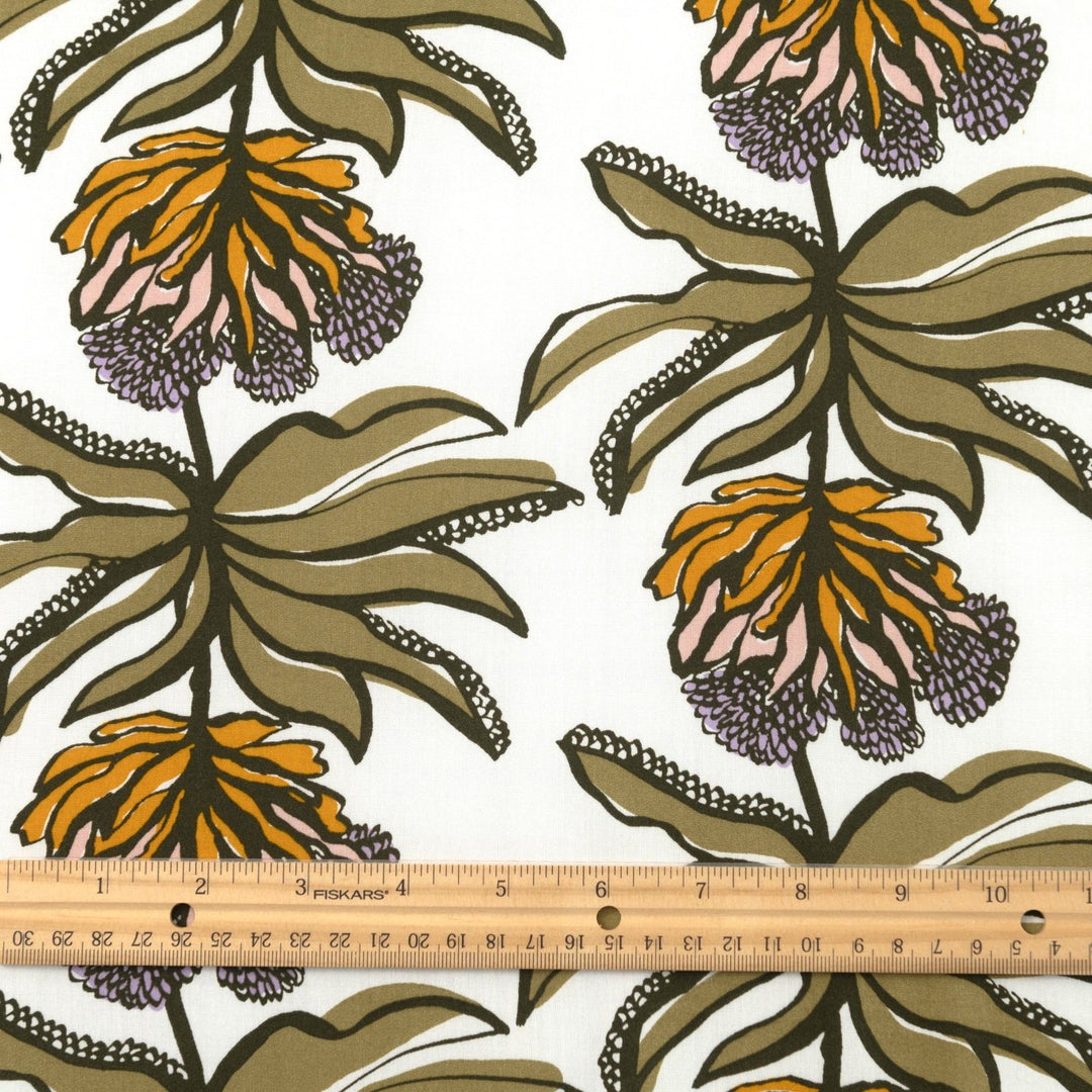 Ecovero Viscose Manifesto Ecru fabric by Nerida Hansen with botanical print in soft ecru and green, 58-inch wide, lightweight and drapey.