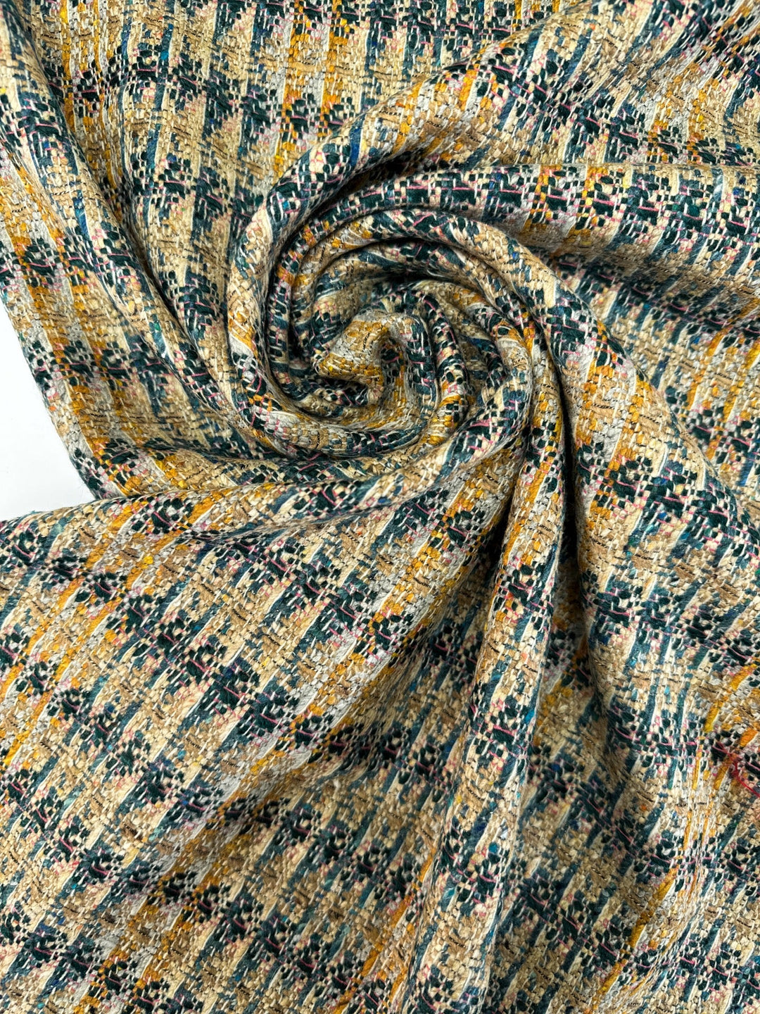 Italian tweed fabric with abstract plaid in beige, blue, and yellow tones, cotton wool blend, perfect for structured coats, suiting, and dresses.
