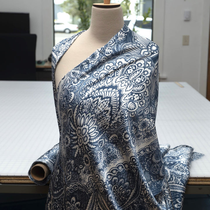 Damask Blue Woven Satin fabric with silky smooth finish and intricate pattern, 55-inch wide viscose-elastane blend.