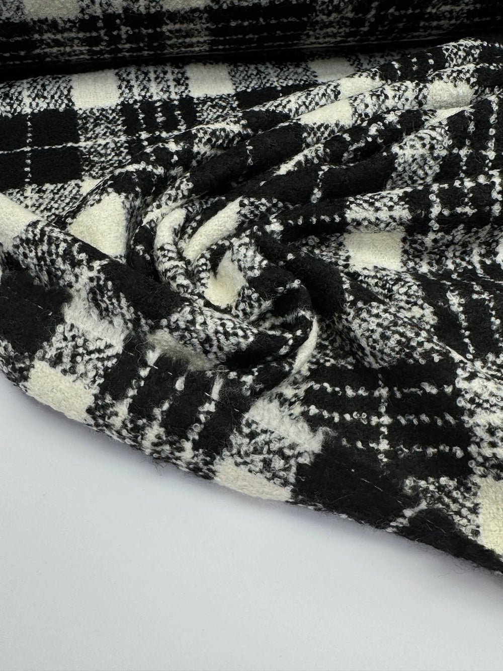 Black and white plaid tweed bouclé wool blend fabric, Italian twill weave, 55-inch wide, ideal for coats, jackets, skirts, and tailored suits