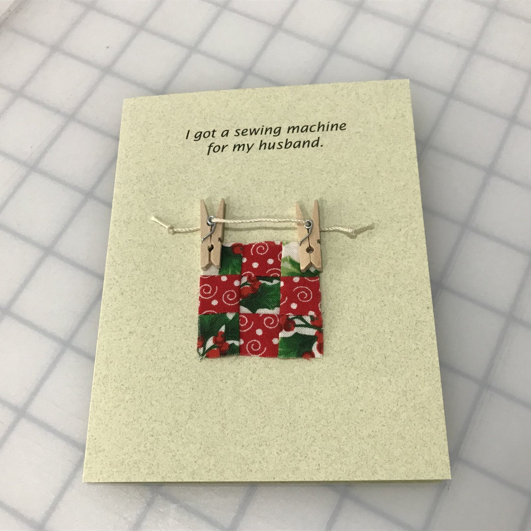 Funny sewing-themed note card with 'I got a sewing machine for my husband' quote and matching envelope, perfect for crafters