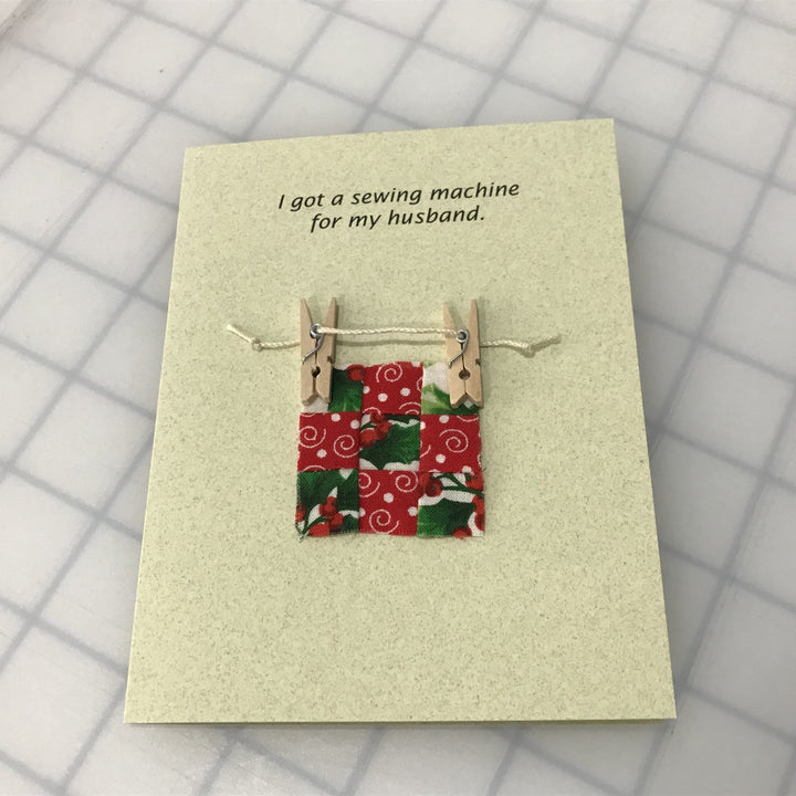 Funny sewing-themed note card with 'I got a sewing machine for my husband' quote and matching envelope, perfect for crafters