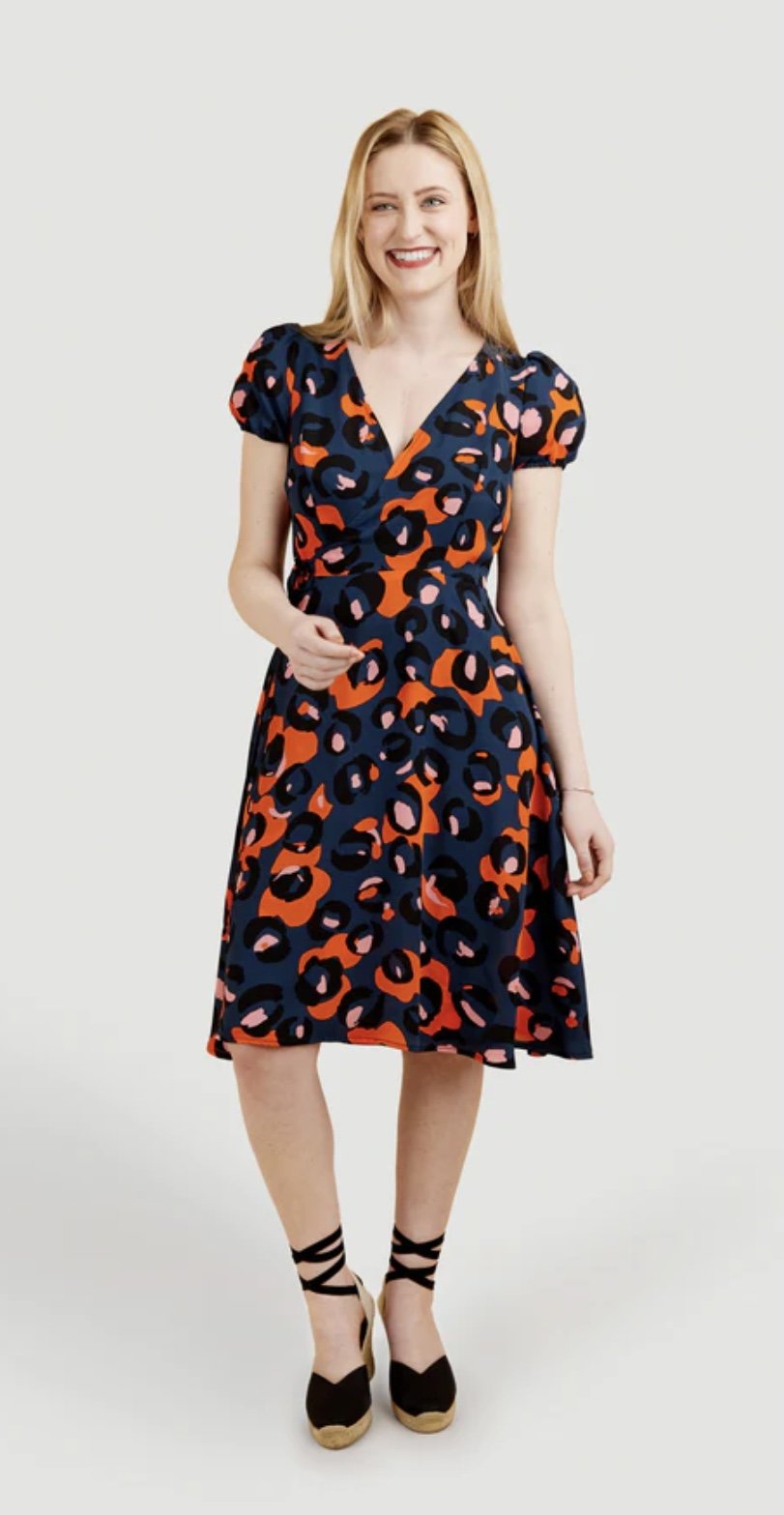 Cashmerette Roseclair Dress sewing pattern with wrap design, three sleeve and skirt variations, and curve-friendly fit in sizes 0–32.