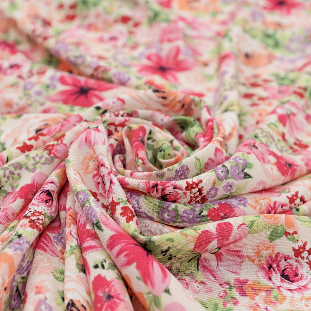 Viscose Challis Soft Spring Meadow fabric with pastel floral print in purple and pink – lightweight OEKO-TEX certified material for dresses, skirts, and blouses