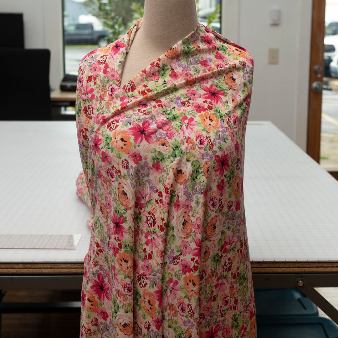 Viscose Challis Soft Spring Meadow fabric with pastel floral print in purple and pink – lightweight OEKO-TEX certified material for dresses, skirts, and blouses