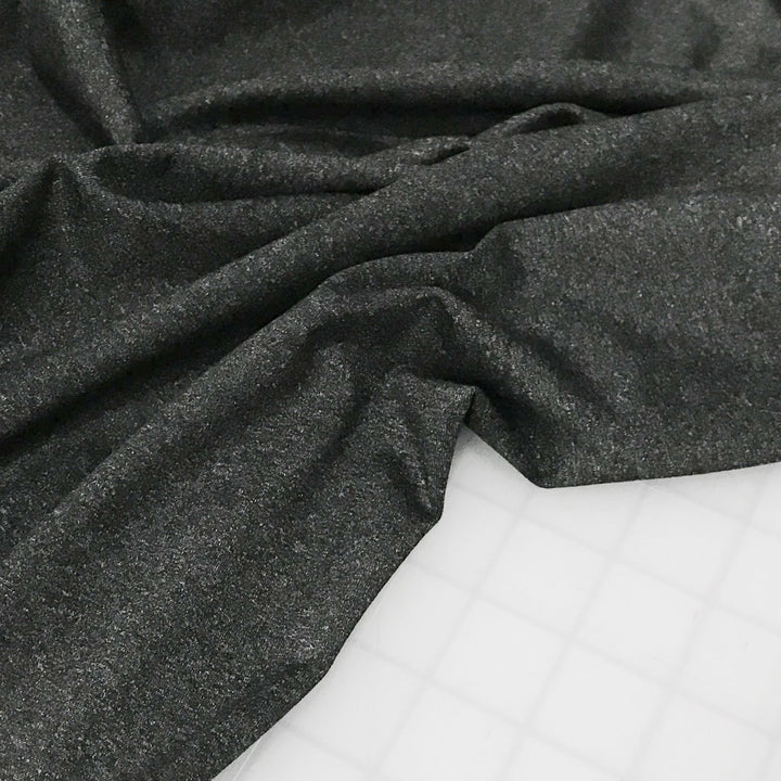 Heathered charcoal stretch supplex fabric, OEKO-TEX certified, soft nylon spandex blend for leggings, yoga wear, and activewear sewing