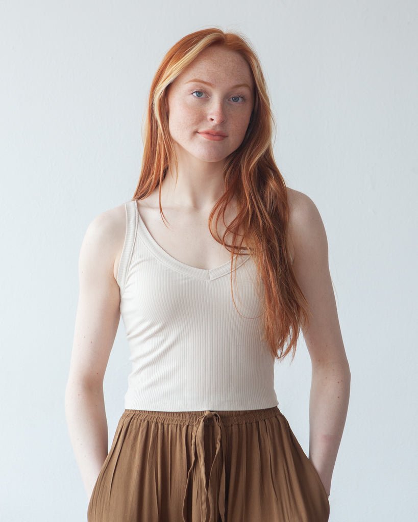 True Bias Zoey Tank & Dress sewing pattern with cropped tank, hip-length tank, and fit-and-flare dress variations in sizes 0–32.