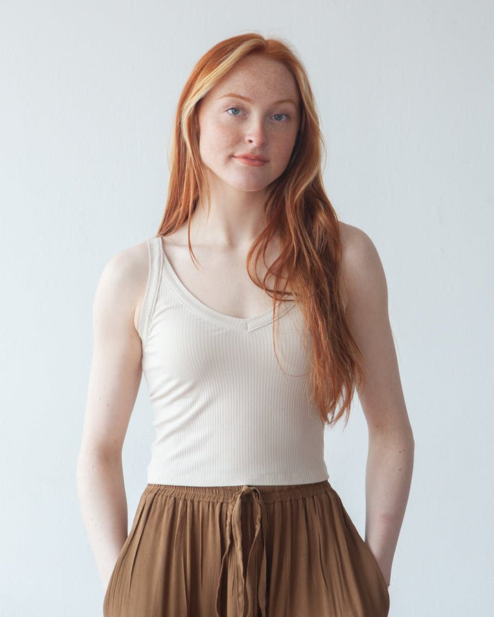 True Bias Zoey Tank & Dress sewing pattern with cropped tank, hip-length tank, and fit-and-flare dress variations in sizes 0–32.