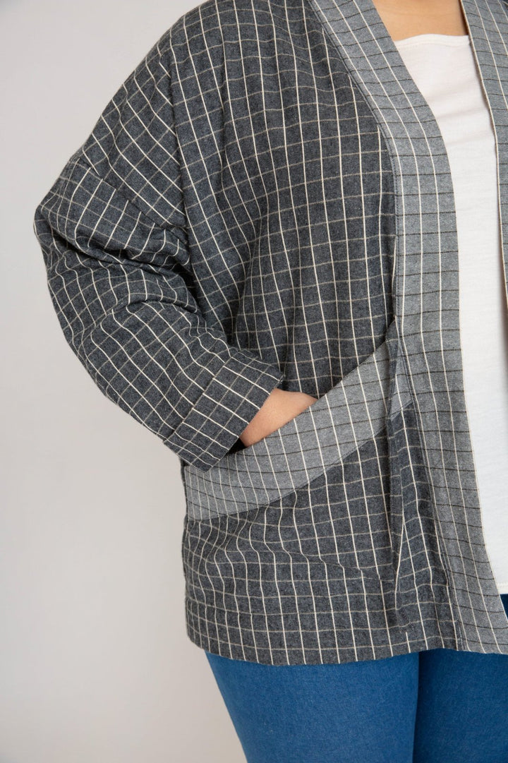 Megan Nielsen Hovea sewing pattern for curvy sizes, featuring loose-fit drop shoulder jackets and coats with multiple lengths
