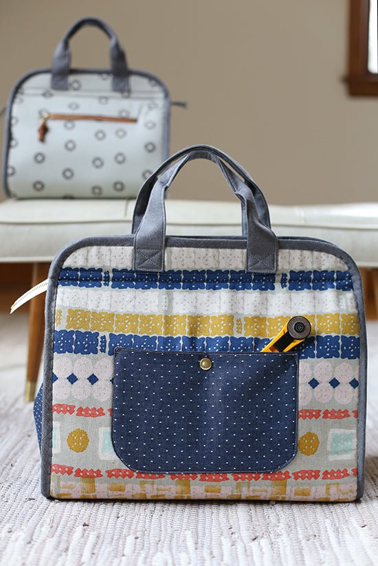 Noodlehead Maker’s Tote sewing pattern for DIY craft organizer bag with zippered pockets and two sizes