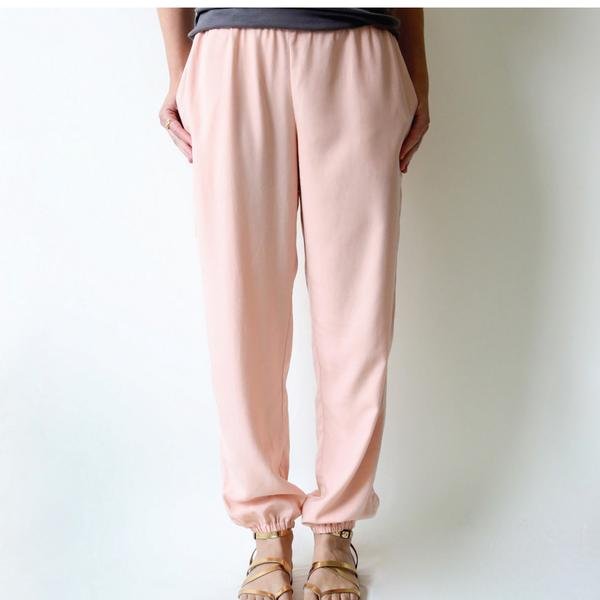 Made by Rae Luna Pants sewing pattern with tapered leg, inseam pockets, and loose comfortable fit in multiple fabrics