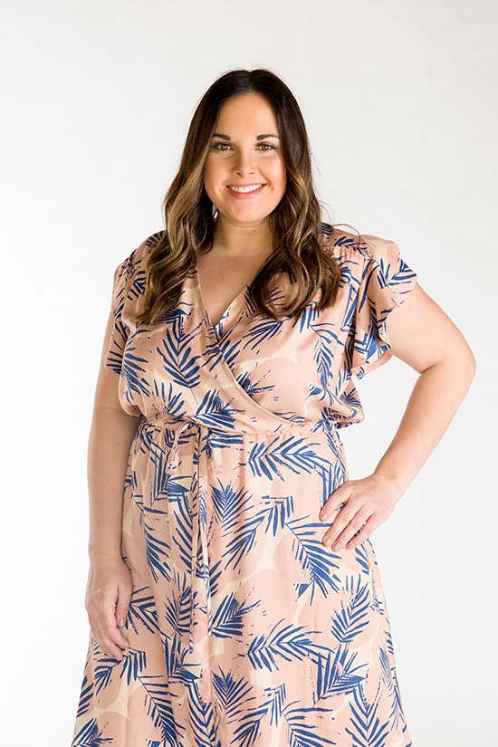 Chalk & Notch Orchid Midi Dress sewing pattern featuring wrap bodice, flowing midi skirt, and sleeve options with ruffle or long gathered sleeves.