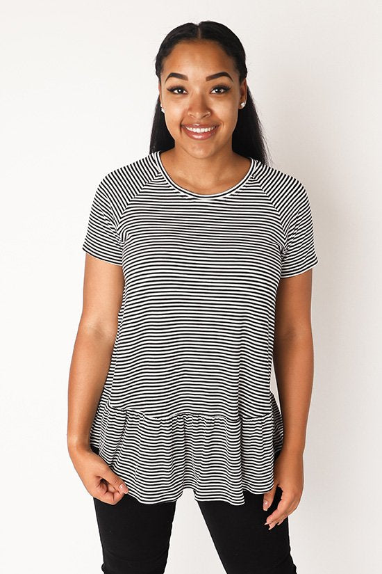 Chalk & Notch Waterfall Raglan sewing pattern with cropped, ruffle top, and ruffle dress options