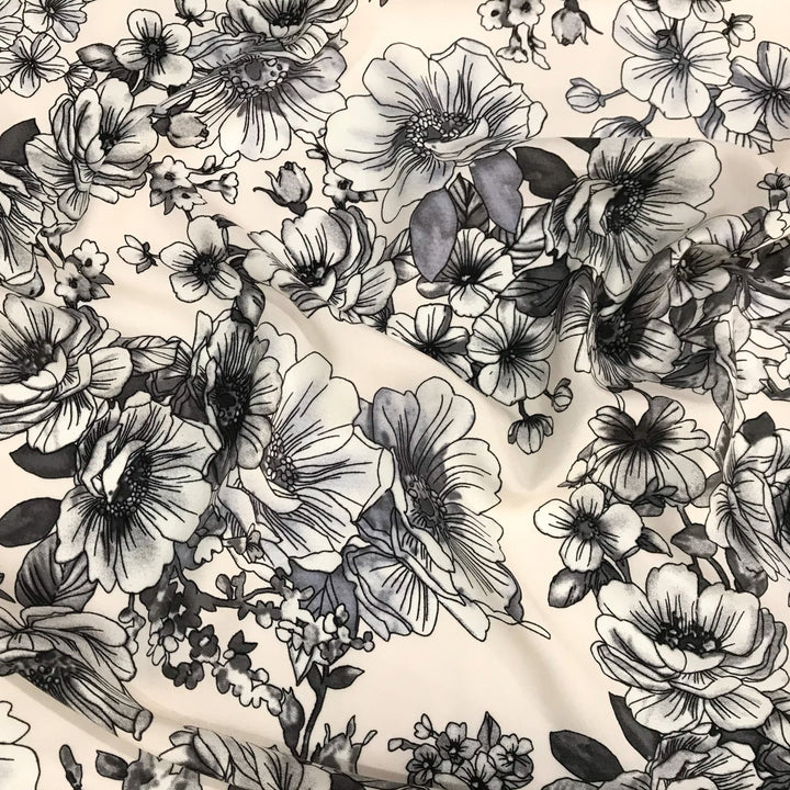 Rayon Challis Graphite Floral fabric with grayscale floral pattern on cream background, soft and lightweight for sewing projects
