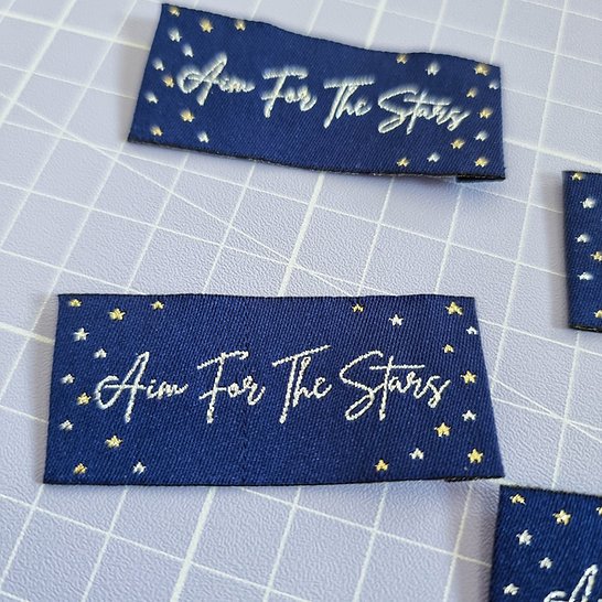 SA Labels Aim for the Stars metallic garment tags with shimmering font and star details