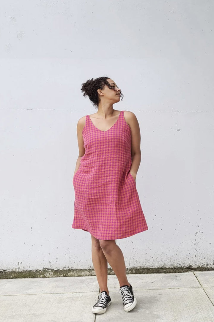 Sew House Seven Sauvie Sundress sewing pattern for standard sizes 00–20 with strappy V-neck design, pocket variations, and customizable lengths.