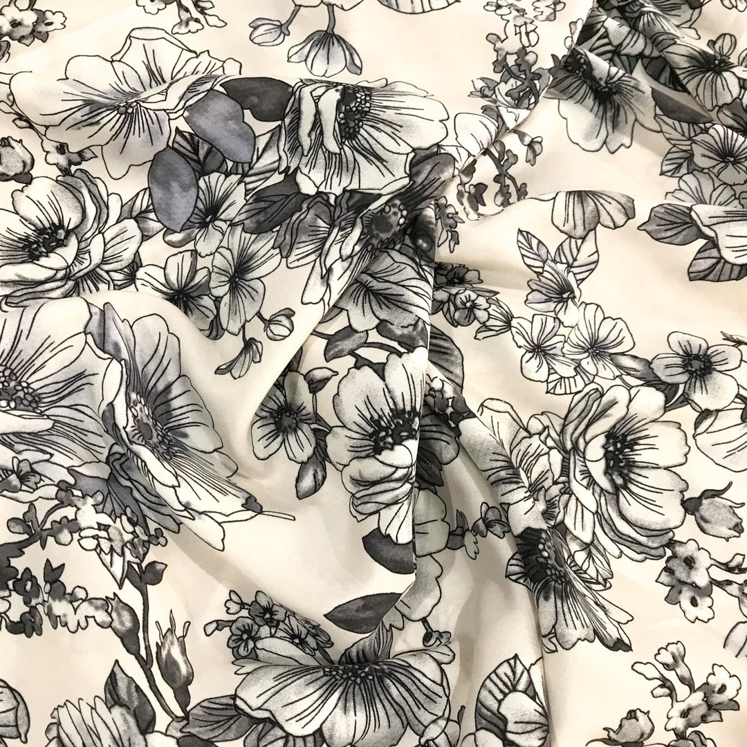 Rayon Challis Graphite Floral fabric with grayscale floral pattern on cream background, soft and lightweight for sewing projects
