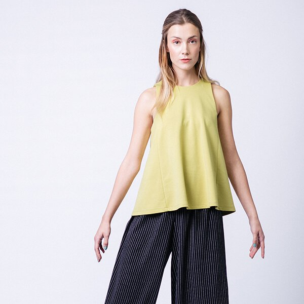 Named Clothing Minttu Swing Top sewing pattern – loose-fitting A-line jersey top with round neckline and no side seams.