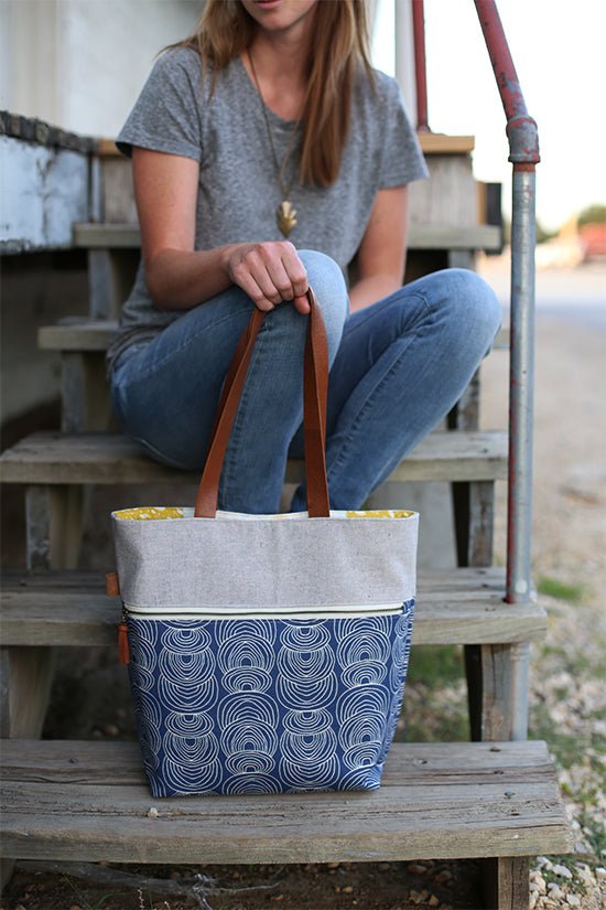 Noodlehead Caravan Tote and Pouch sewing pattern for DIY knitting bag with zippered pockets and matching accessory