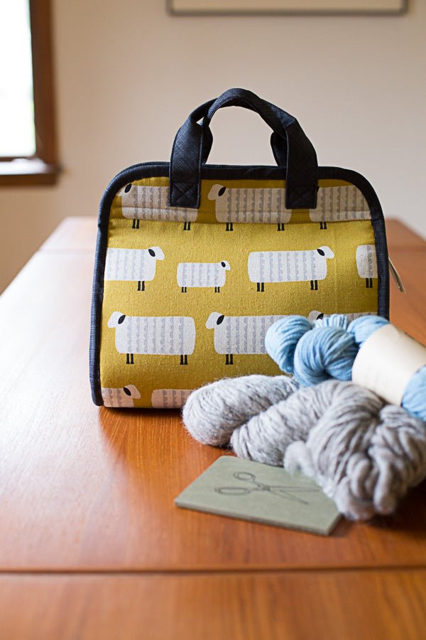 Noodlehead Maker’s Tote sewing pattern for DIY craft organizer bag with zippered pockets and two sizes